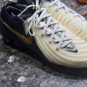 Nike soccer Black and Gold Athletic Shoes